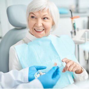 a patient talks with her dentist